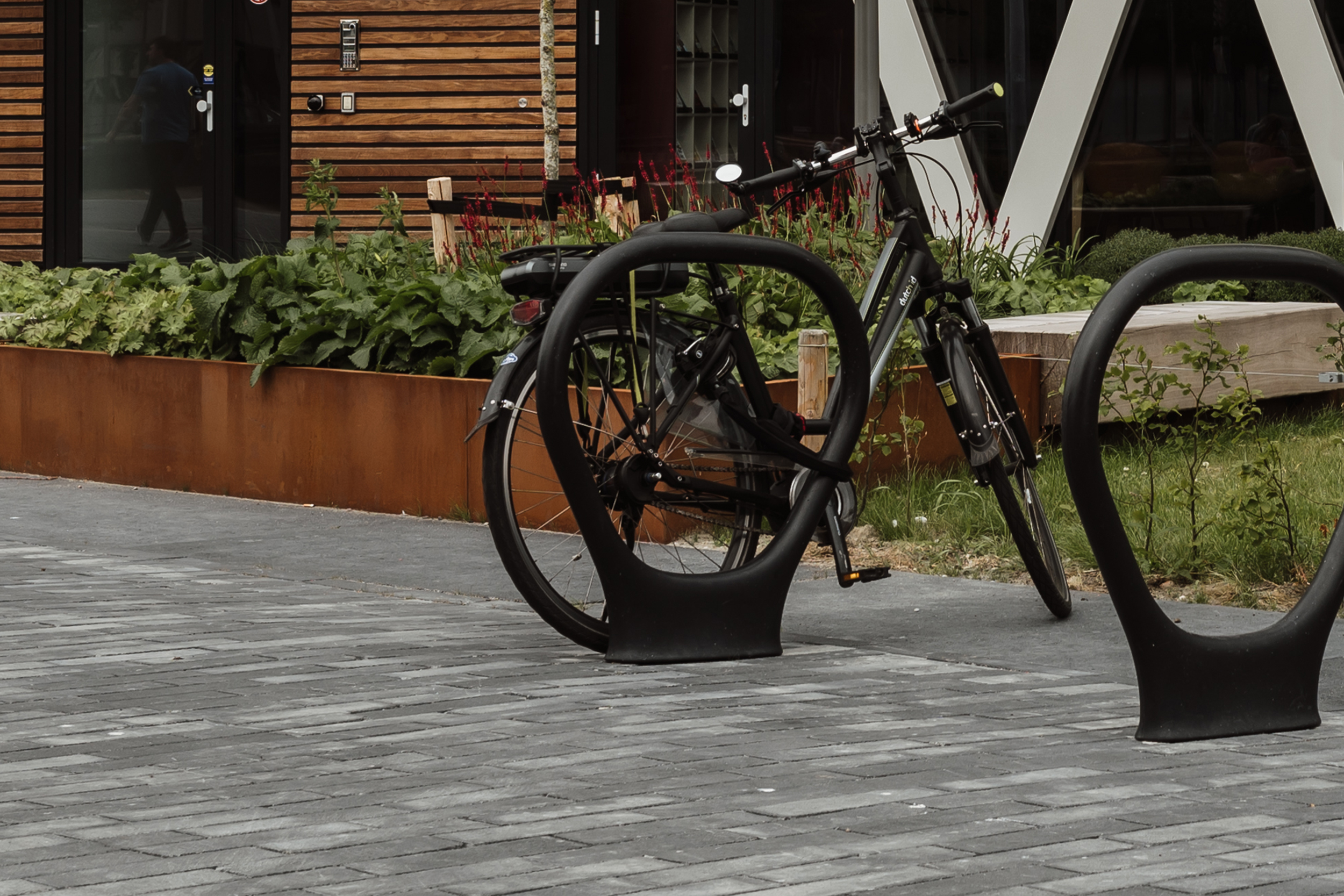 Durbanis design firm manufactures bicycle racks in recycled polyethylene