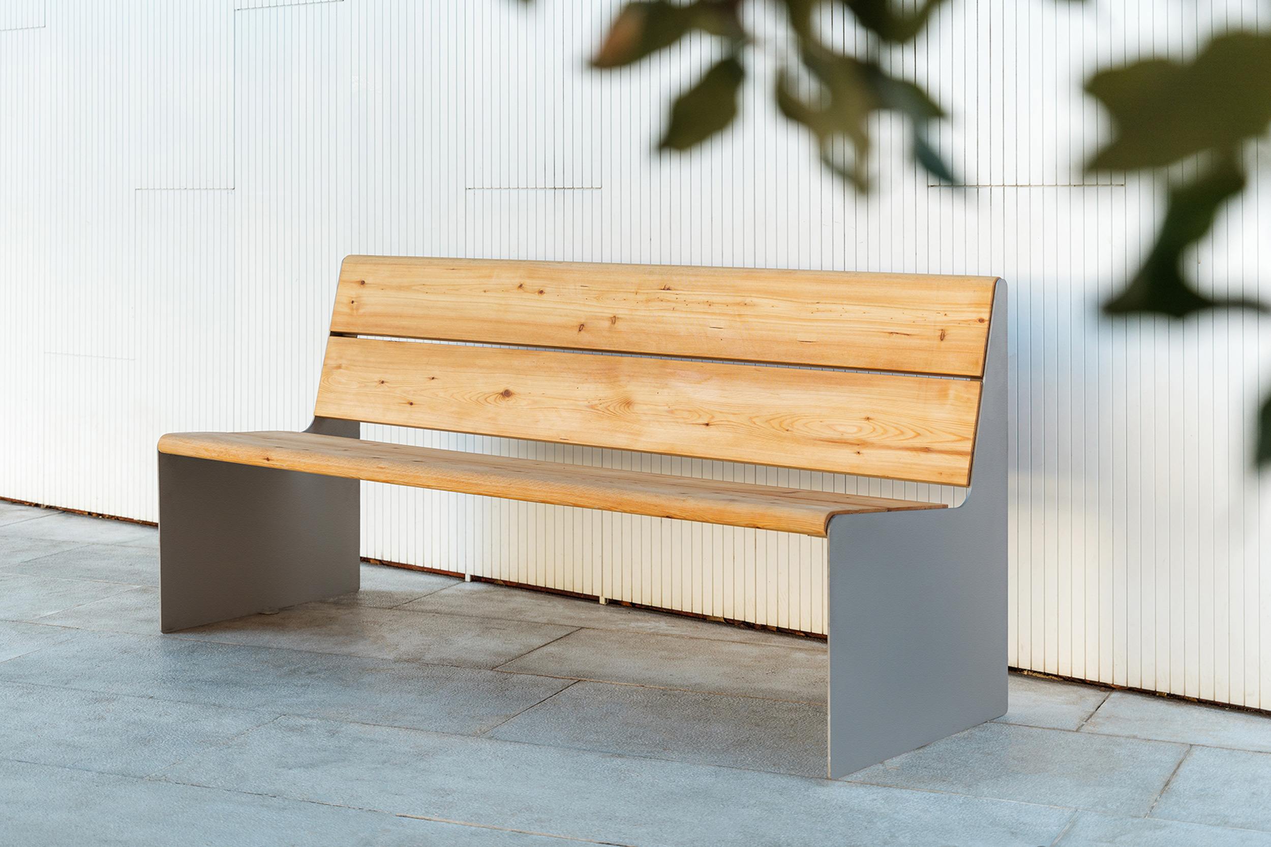 A street bench, specially designed to prioritize comfort and aesthetics in public spaces
